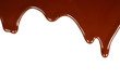 Melted chocolate dripping on white background .