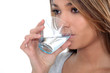 Woman drinking a glass of water