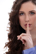 Brunette asking for quiet