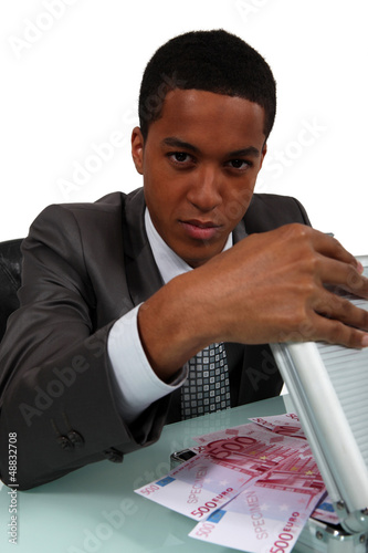 Photo: A crooked businessman A crooked businessman