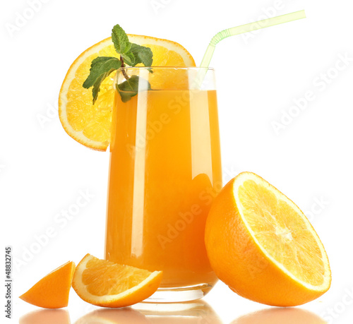 Photo: Glass of orange juice with mint and orange isolated on white Glass of orange juice with mint and orange isolated on white
