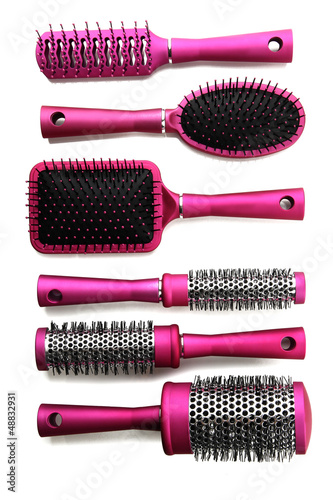Photo: Comb brushes, isolated on white Comb brushes, isolated on white