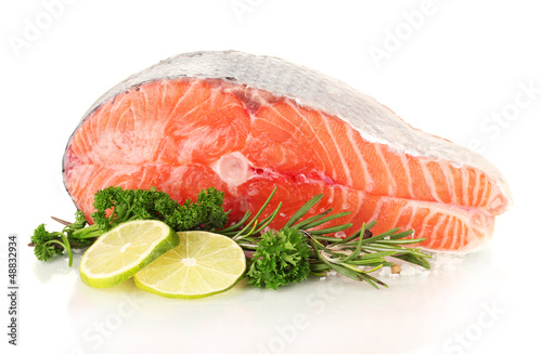 Photo: Fresh salmon steak, isolated on white Fresh salmon steak, isolated on white