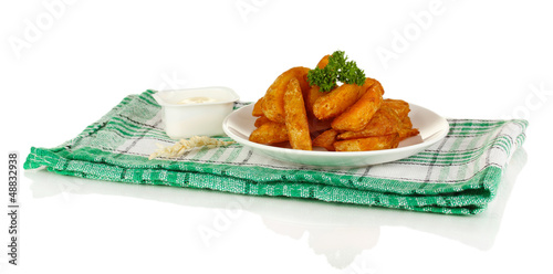 Photo: Appetizing village potatoes on plate isolated on white Appetizing village potatoes on plate isolated on white