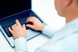 Image of businessman working on laptop