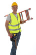 Construction worker wearing hard hat and vest