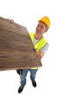 Construction worker wearing hard hat and vest