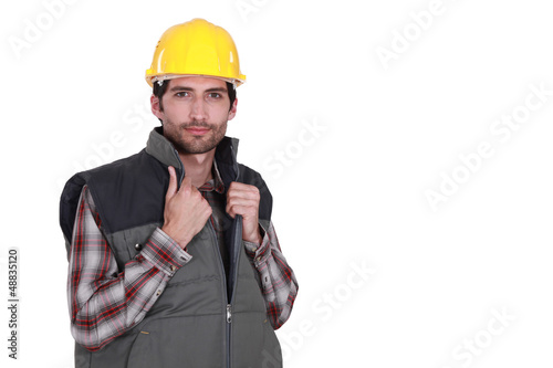 Photo: portrait of attractive craftsman isolated on white portrait of attractive craftsman isolated on white