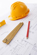 Hard hat and tools on a blueprint