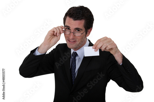 Photo: Executive with a business card Executive with a business card