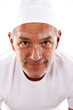 Portrait of a man wearing white hat and t-shirt