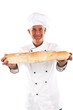 Baker holding bread