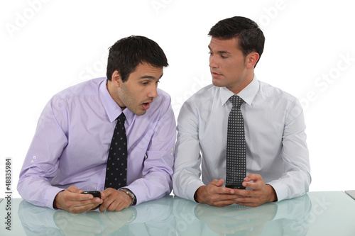 Photo: Business associates discussing their business plan Business associates discussing their business plan