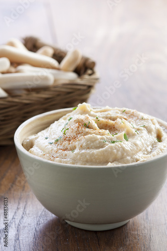 Photo: Chickpea hummus bowl with bread sticks Chickpea hummus bowl with bread sticks