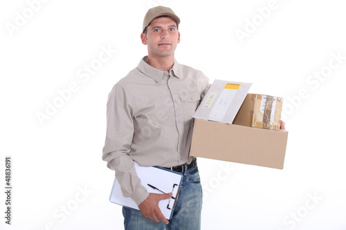 Photo: Man delivering post Man delivering post