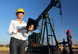 Foto: Workers in an Oilfield, teamwork Workers in an Oilfield, teamwork