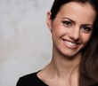 Photo: Young brunette woman with beautiful smile Young brunette woman with beautiful smile