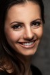Photo: Young brunette woman with beautiful smile Young brunette woman with beautiful smile