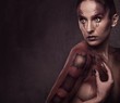 Photo: Woman with snake body-art Woman with snake body-art