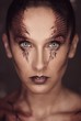 Photo: Woman with snake body-art Woman with snake body-art