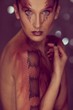 Photo: Woman with snake body-art Woman with snake body-art