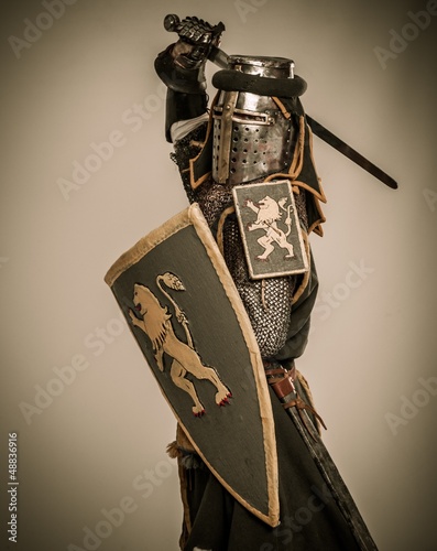 Photo: Medieval knight with sword and shield Medieval knight with sword and shield