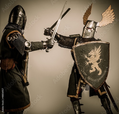 Photo: Fight between two medieval knight Fight between two medieval knight