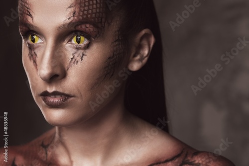 Photo: Woman with snake body-art Woman with snake body-art