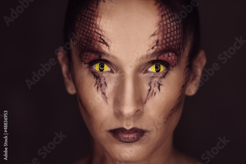 Photo: Woman with snake body-art Woman with snake body-art