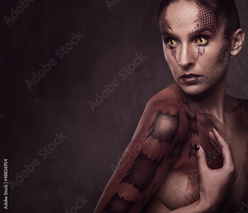 Photo: Woman with snake body-art Woman with snake body-art