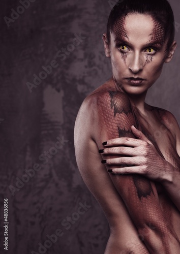 Photo: Woman with snake body-art Woman with snake body-art