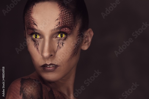 Photo: Woman with snake body-art Woman with snake body-art