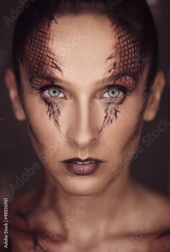 Photo: Woman with snake body-art Woman with snake body-art