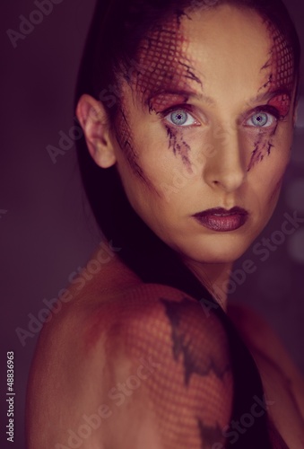 Photo: Woman with snake body-art Woman with snake body-art