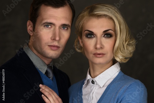 Photo: Portrait of well-dressed elegant couple Portrait of well-dressed elegant couple