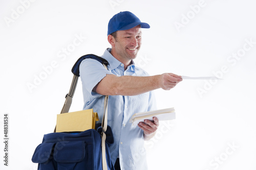 Photo: Mailman delivering mail Mailman delivering mail