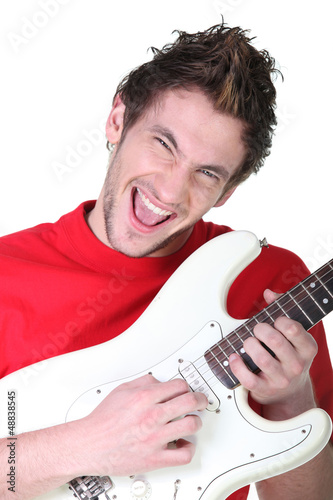 Photo: Portrait of a man with a guitar Portrait of a man with a guitar