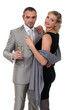 Elegant couple celebrating with champagne