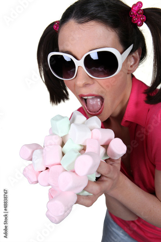 Photo: Girl going crazy for marshmallows Girl going crazy for marshmallows