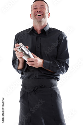 Photo: Bartender shaking cocktail shaker. Bartender shaking cocktail shaker.