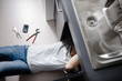 Plumber working on kitchen sink