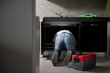 Plumber working on kitchen sink