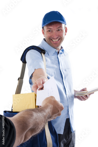 Photo: Mailman delivering mail Mailman delivering mail