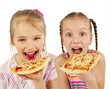 Young girls preparing homemade pizza