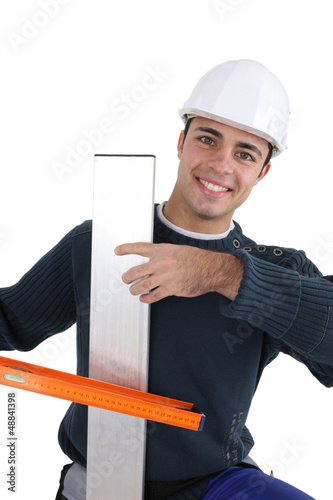 Photo: Worker with spirit level Worker with spirit level