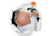 Pregnant woman holding flower
