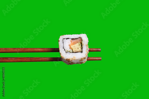 Photo: California roll on chopsticks California roll on chopsticks