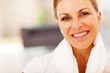 fit middle aged woman closeup portrait with towel on her neck
