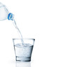 Bottle of water with a glass