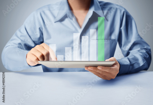 Photo: touch screen tablet with a graph touch screen tablet with a graph